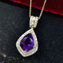 amethyst pendant necklace with moissanite halo and baguette accents in 18k yellow gold over sterling silver