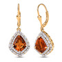 front view of madeira citrine kite cut dangle earrings with moissanite halo and baguette accents in 18k yellow gold over sterling silver