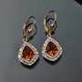 madeira citrine kite cut dangle earrings with moissanite halo and baguette accents in 18k yellow gold over sterling silver