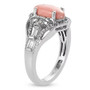 side profile of peach opal and white zircon ring revealing gemstone elevation and baguette zircon placement along the band side profile of peach opal and white zircon ring revealing gemstone elevation and baguette zircon placement along the band