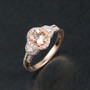 morganite and oval moissanite halo ring in 18k rose gold over sterling silver