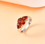angled view of madeira citrine three stone ring in rhodium over sterling silver