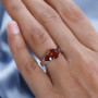 madeira citrine three stone ring in rhodium over sterling silver worn on a hand