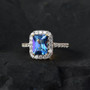 mystic blue petalite and white zircon radiant halo ring in 18k yellow gold over sterling silver