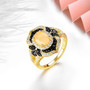 side view of ethiopian opal black spinel and white zircon ring in 18k yellow gold over sterling silver