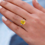 yellow opal and diamond ring in 10k yellow gold shown for size comparison