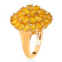 side profile of yellow opal cluster ring showing raised multi-tiered gemstone setting and polished yellow gold band