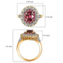 rubellite tourmaline yellow and white diamond halo ring in 14k yellow gold shown for size comparison
