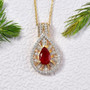 fire opal pear halo pendant displayed on textured background with moissanite halo and yellow gold accents