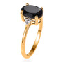 angled view of black tourmaline and white zircon accents oval solitaire ring in 18k yellow gold over sterling silver