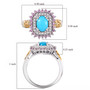 turquoise pink sapphire and zircon halo ring in 18k yellow gold and rhodium over sterling silver shown for size comparison