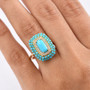 measurement image of turquoise and zircon halo ring showing dimensions in yellow gold over sterling silver