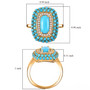 turquoise and zircon halo ring in 18k yellow gold over sterling silver shown for size comparison