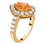 side view of spessartine garnet and white zircon pear double halo ring in 18k yellow gold over sterling silver