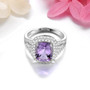 close up of amethyst and white zircon cushion double halo ring in rhodium over sterling silver