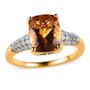 front view of honey scapolite and moissanite cushion solitaire ring in 18k yellow gold over sterling silver