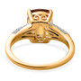 close up of honey scapolite and moissanite cushion solitaire ring in 18k yellow gold over sterling silver