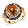 front view of honey scapolite brown and white zircon double halo ring in 18k yellow gold over sterling silver