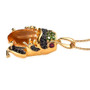 side view of citrine and multi gem frog pendant necklace in 18k yellow gold over sterling silver