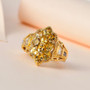 close up of golden tanzanite and white zircon accents cluster ring in 18k yellow gold over sterling silver