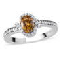front view of golden tanzanite and white zircon halo ring in rhodium over sterling silver