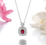 ruby and white zircon necklace in rhodium over 925 sterling silver shown in a lifestyle photo