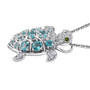 side view of blue apatite chrome diopside and zircon turtle pendant necklace in rhodium over sterling silver