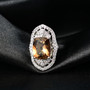 honey scapolite and white zircon ring in rhodium over sterling silver