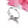back view of ruby and white zircon ring in rhodium over 925 sterling silver