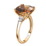 side view of honey scapolite and diamond solitaire ring in 10k yellow gold