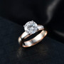 lab diamond round solitaire ring in two-tone 10k rose gold and 950 platinum e-f vs shown in a lifestyle photo