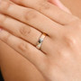 950 platinum and 10k rose gold split two-tone 5mm band ring worn on a hand