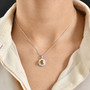 honey scapolite and moissanite halo pendant necklace in rhodium over sterling silver worn around the neck