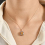 honey scapolite brown and white zircon halo pendant necklace in 18k rose gold over sterling silver worn around the neck