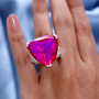 lifestyle image red purple quartz triplet trillion cocktail ring worn on hand