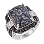 front view of pinolith black cabochon spinel and white topaz ring in rhodium over sterling silver