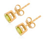 side view of sphene 6mm round stud earrings in 14k yellow gold