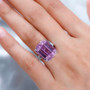 emerald cut kunzite cocktail ring with e f vs2 diamonds worn on hand showing scale