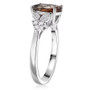 side view of andalusite and oval moissanite ring in rhodium over sterling silver