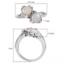 australian white cabochon opal heart bypass ring in rhodium over sterling silver shown for size comparison