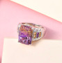 ametrine amethyst and citrine concave cut ring in rhodium over sterling silver shown in a lifestyle photo