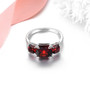 full view of garnet trilogy ring in rhodium over 925 sterling silver