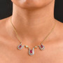 ruby ff and white zircon tulips inspired 18k yellow gold over sterling silver necklace on neck model