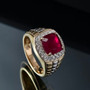 ruby (ff) and lab diamond cushion halo gents ring in two-tone 10k yellow and white gold shown in a lifestyle photo