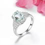 full view of prasiolite and white zircon ring in rhodium over 925 sterling silver