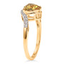 side view of yellow apatite and moissanite bypass ring in 18k yellow gold over sterling silver