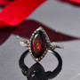 madeira citrine brown and white zircon marquise ring in rhodium over sterling silver shown in a lifestyle photo
