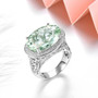 prasiolite and white zircon openwork ring in rhodium over 925 sterling silver shown in a lifestyle photo