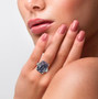 tiffany stone and white zircon stars motif ring in rhodium over sterling silver worn on a hand