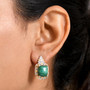 malachite and white zircon earrings in two-tone 18k yellow gold and rhodium over sterling silver worn on the ear